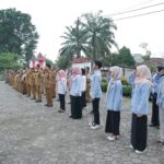 Apel Pagi di Talang Kelapa Tetap Berjalan Meski Hujan, Camat Salinan Tekankan Pelayanan BerAKHLAK